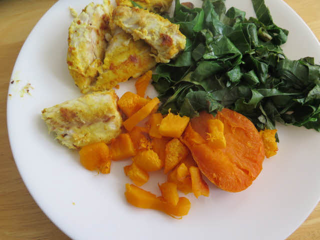 Plate with fish, collards, & squash